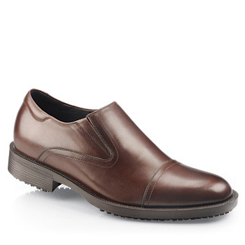Introducing our new Black Label Collection - handcrafted from fine Italian leather. This premium footwear collection combines luxurious Italian-inspired craftsmanship with the world’s #1 rated slip-resistant outsole. It’s the perfect balance of comfort safety and impeccable style. A sophisticated slip-on designed for incredible comfort and traction. Clean seam detailing is paired with our legendary shock-absorbing slip-resistant outsole in this traditional capped toe style. Dual-density leather-lined insoles a cushioned footboard and steel shank add support and all-day comfort for extended walking and standing. The Statesman is handcrafted from fine Italian leather. Shoes For Crews - Statesman - Men’s / Brown No Slip Dress Shoes