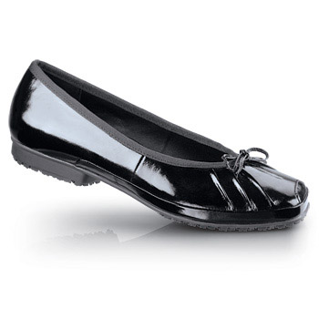 A feminine look that’s tough on safety. Elevate your look at work in this pretty patent leather slipper fitted with our exclusive SFC Mighty Grip outsole and lightweight flexible midsole. This water-resistant style includes cushioned insoles for lasting comfort and a steel shank for arch support. Shoes For Crews - Ballerina - Black / Women’s Skid Resistant Dress Shoes