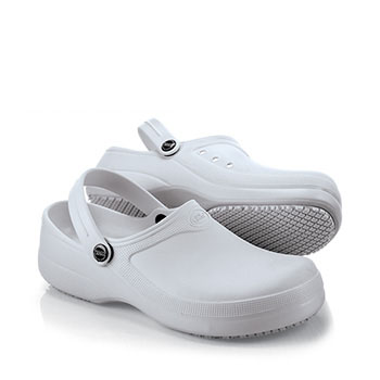 This versatile vegan style is a trusted all-around favorite.It began in the kitchen and can now be found everywhere. This is the multi-tasking shoe that started it all with its self-massaging insoles legendary slip-resistant outsole and pivotal strap for heel support. Made of durable anti-bacterial high-grade EVA/rubber blend. Shoes For Crews - SFC Froggz® Classic - White Skid Resistant Clogs