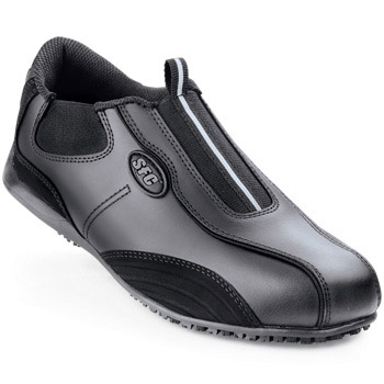 Make a statement with this trend-setting slip-on.Contour stitching nubuck accents and water-resistant genuine leather give this cozy slip-on a fashionable look. The patented SFC Mighty Grip slip-resistant outsole keeps you safe while the steel shank and removable cushioned insoles provide comfort and support all shift long. Elastic goring ensures a great fit. Shoes For Crews - Blaze - Black / Women’s Skid Resistant Athletic Shoes
