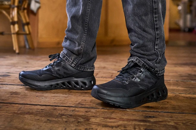 man wearing Shoes For Crews shoes