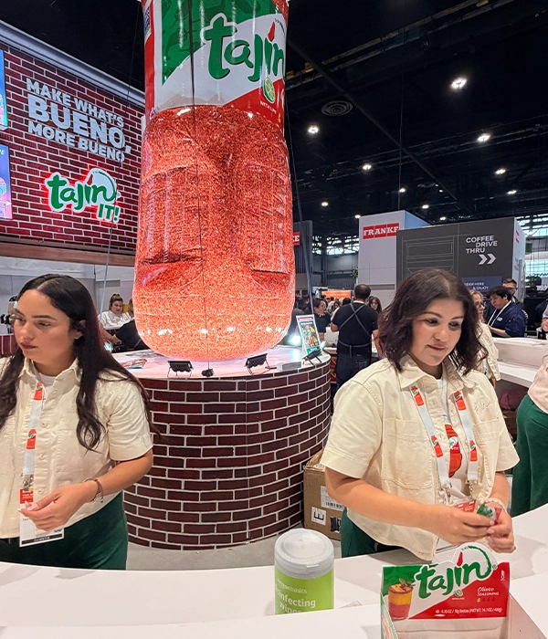 Tajin booth with giant bottle display